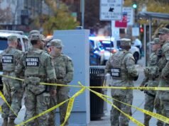 Dois membros baleados perto da Casa Branca, suspeito sob custódia